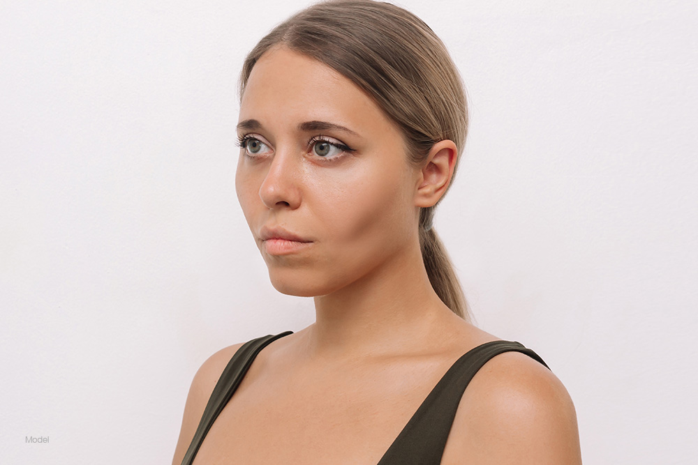 Young woman with a sunken face